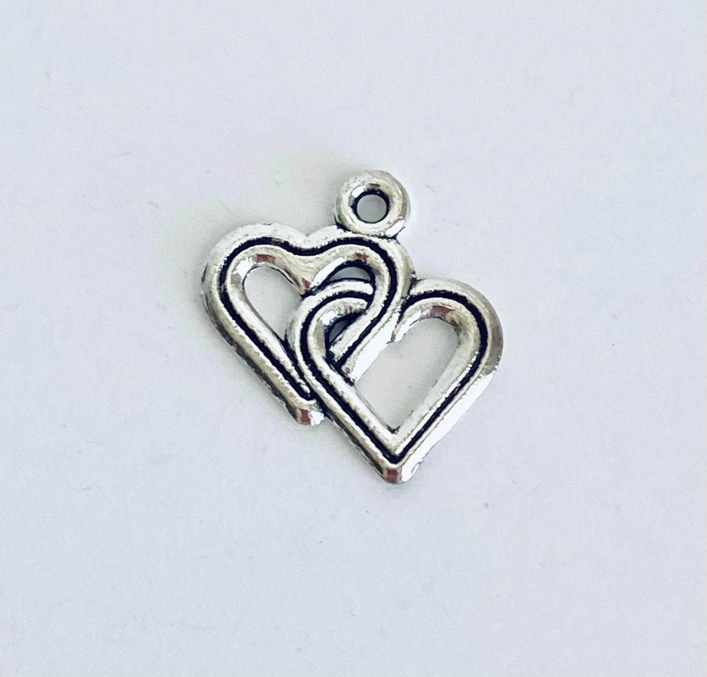 Base Metal Interlocking Heart Charm