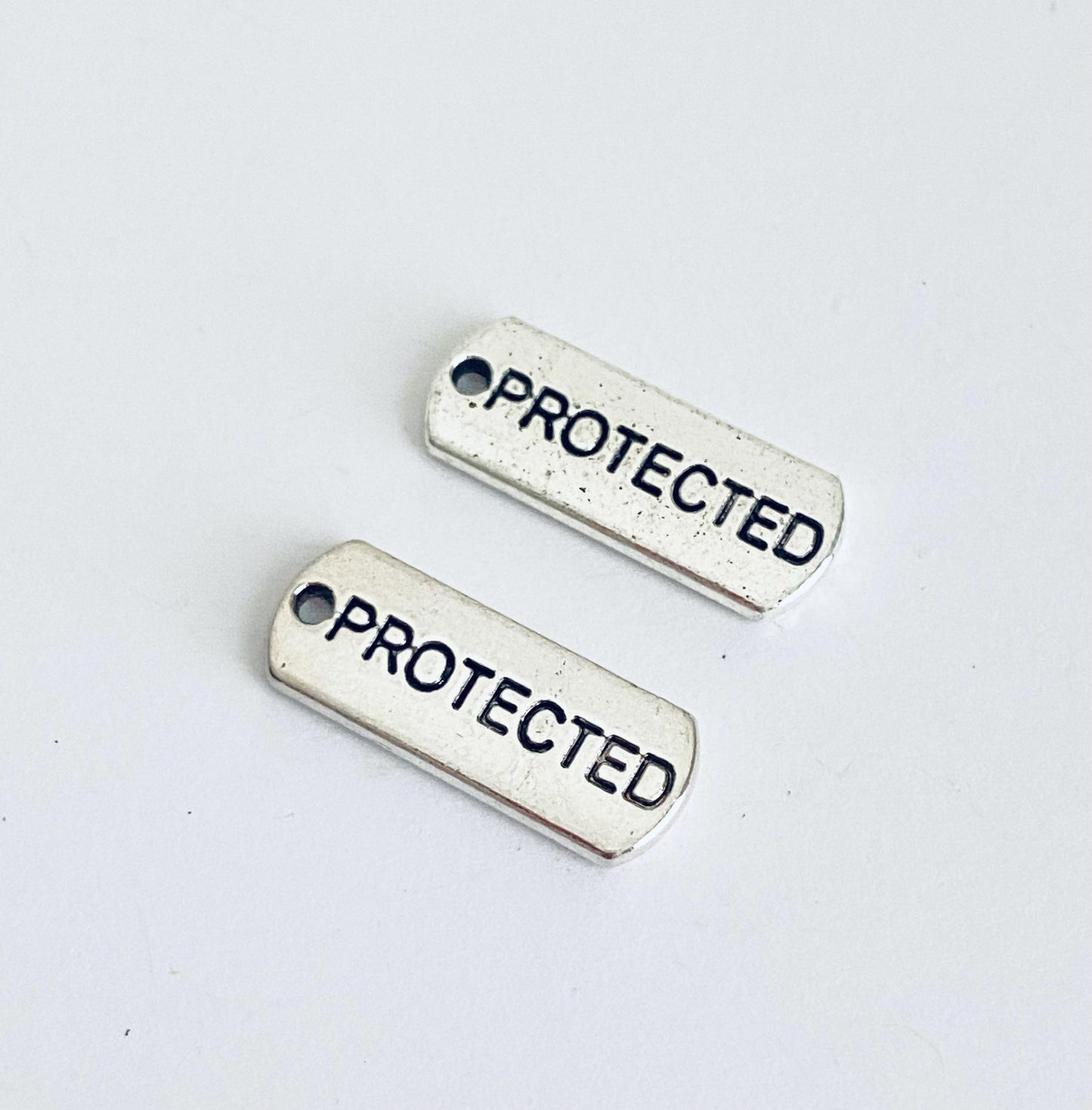 Base Metal Protected Charm