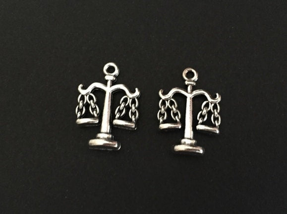 Scales Charm. Balance Charm