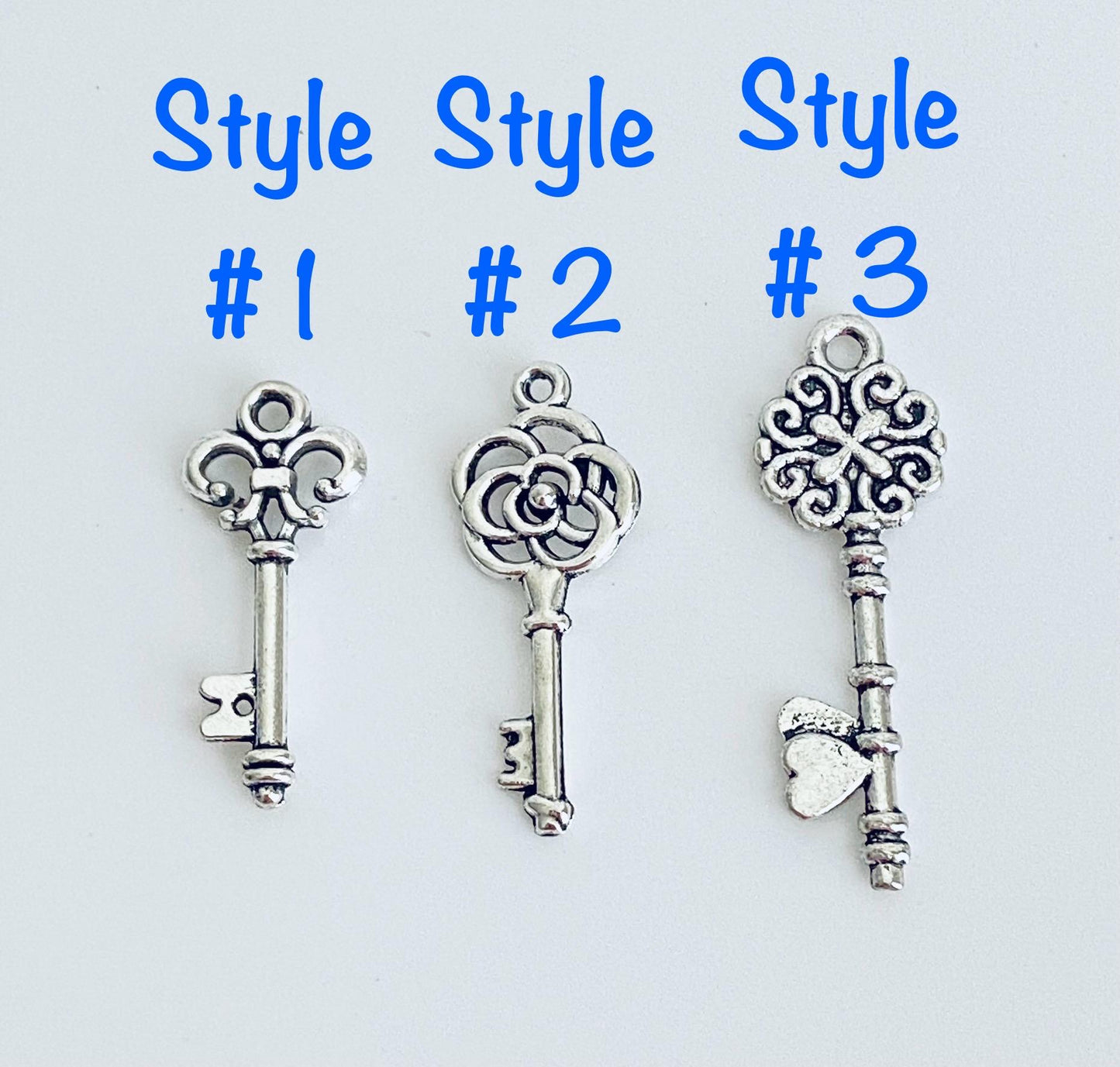Base Metal Key Charm