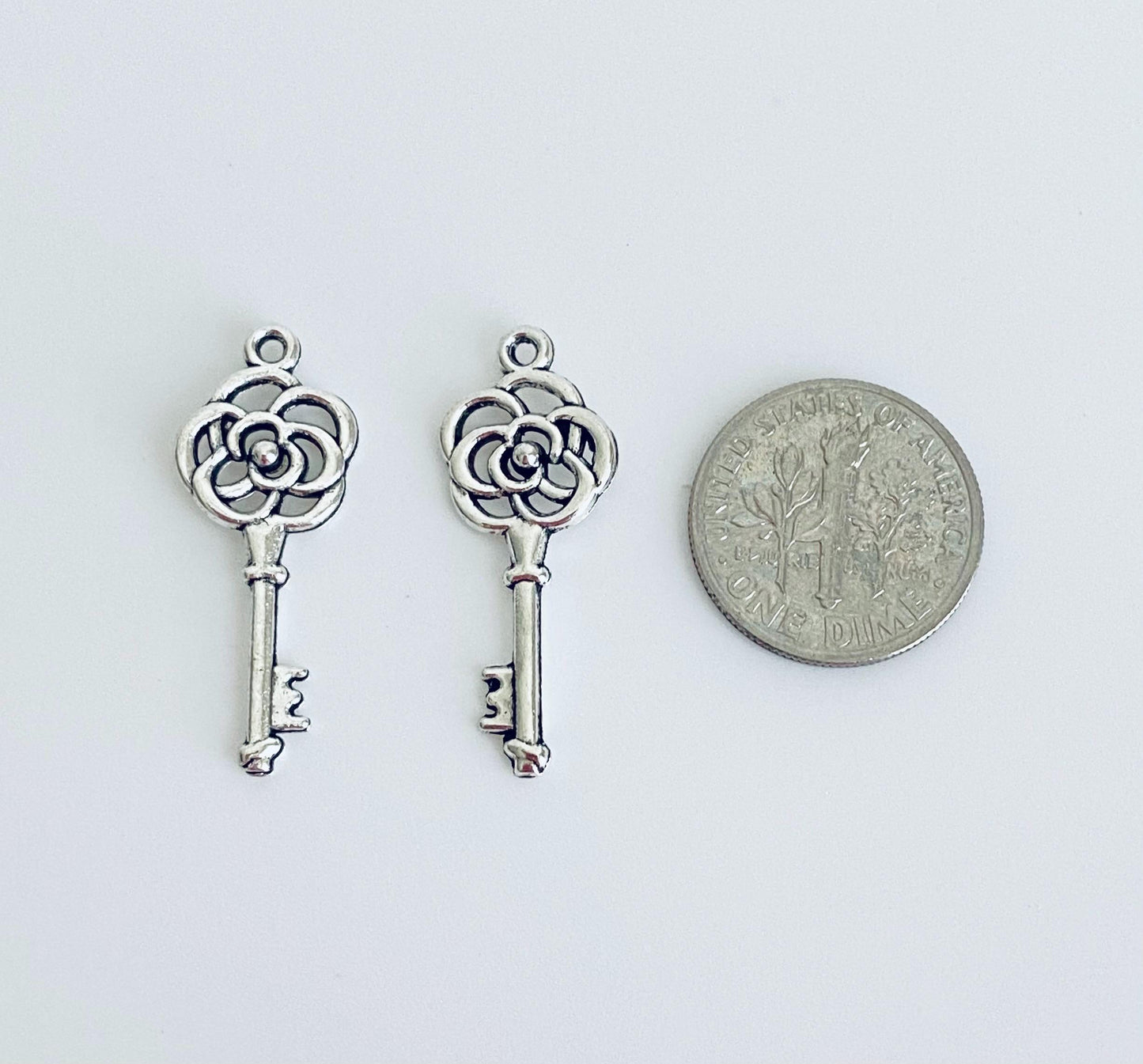 Base Metal Key Charm