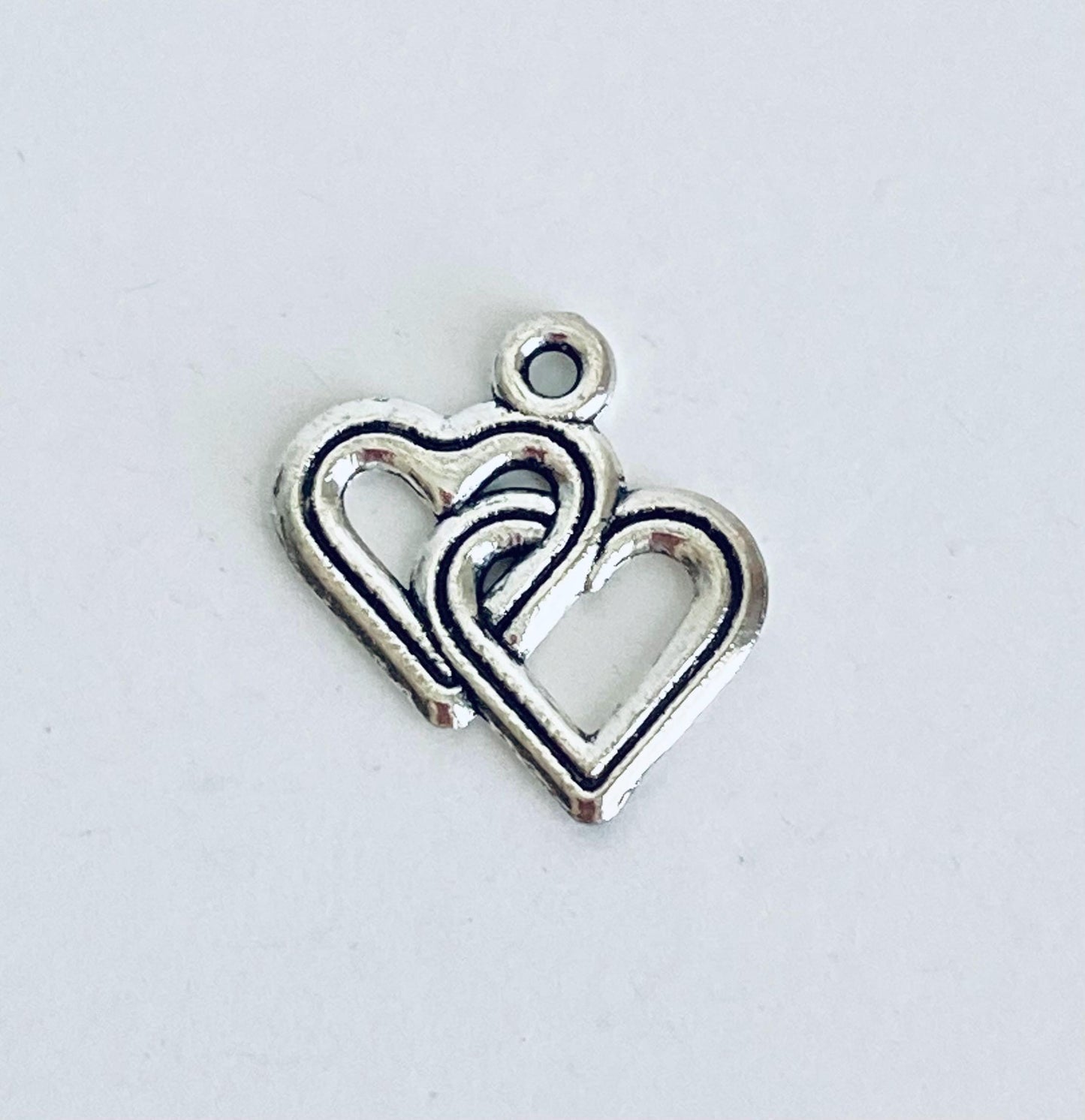 Base Metal Interlocking Heart Charm