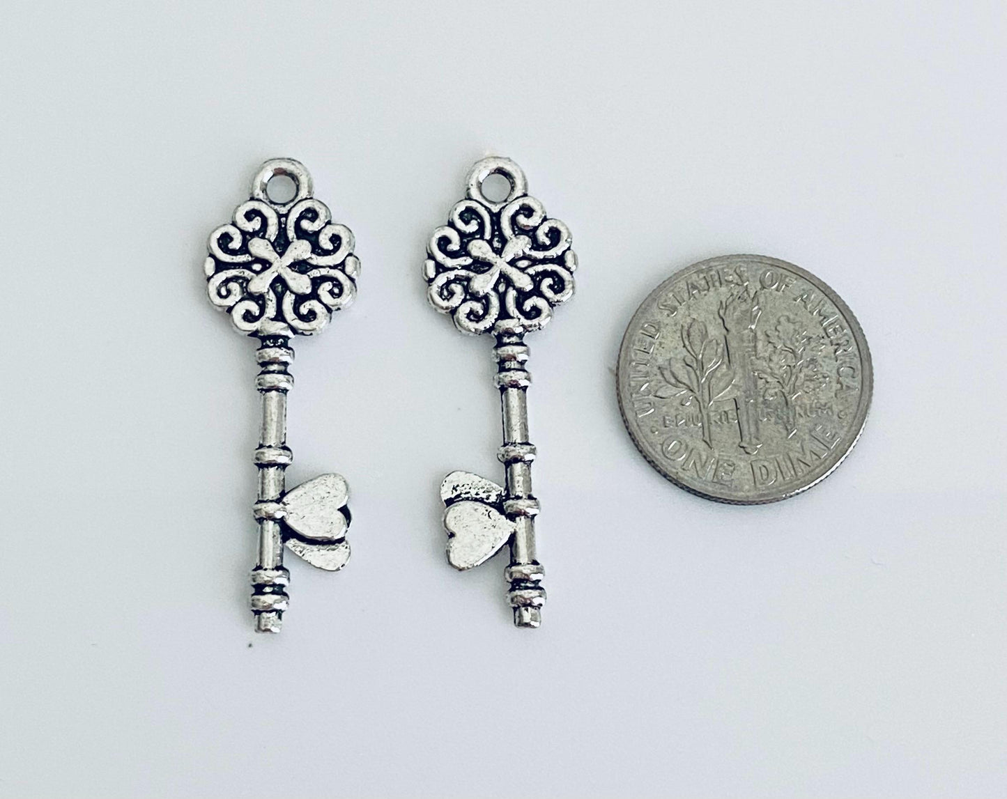 Base Metal Key Charm