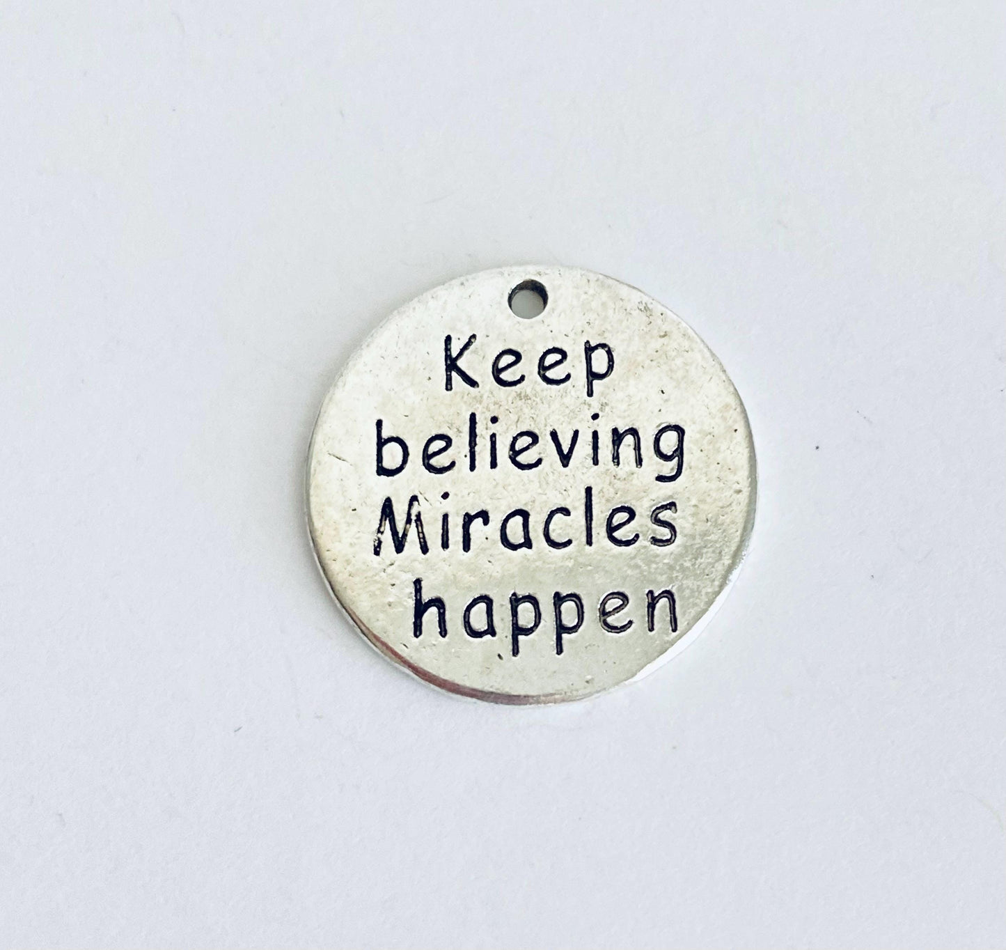 Keep believing miracles happen Charm