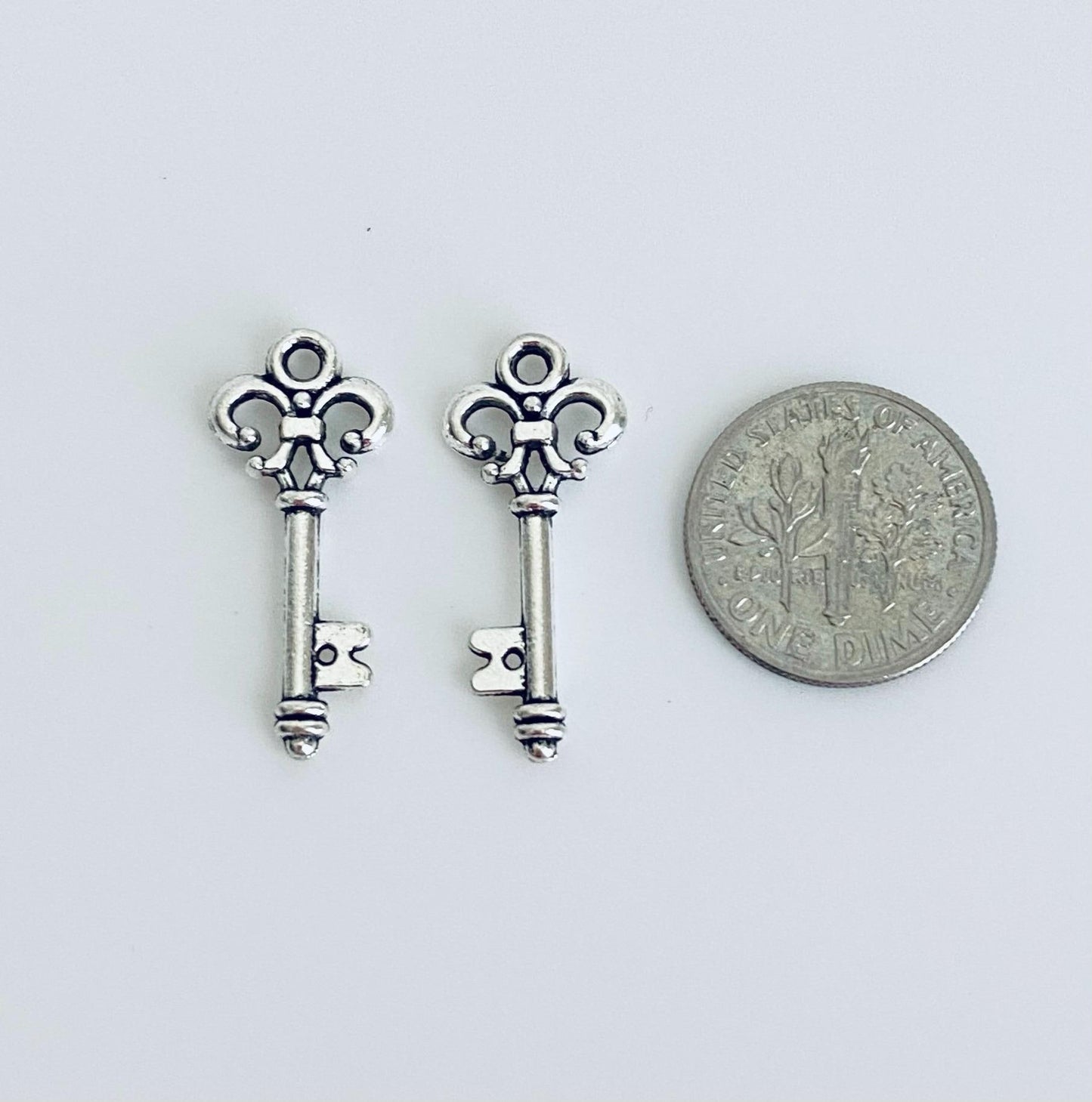 Base Metal Key Charm