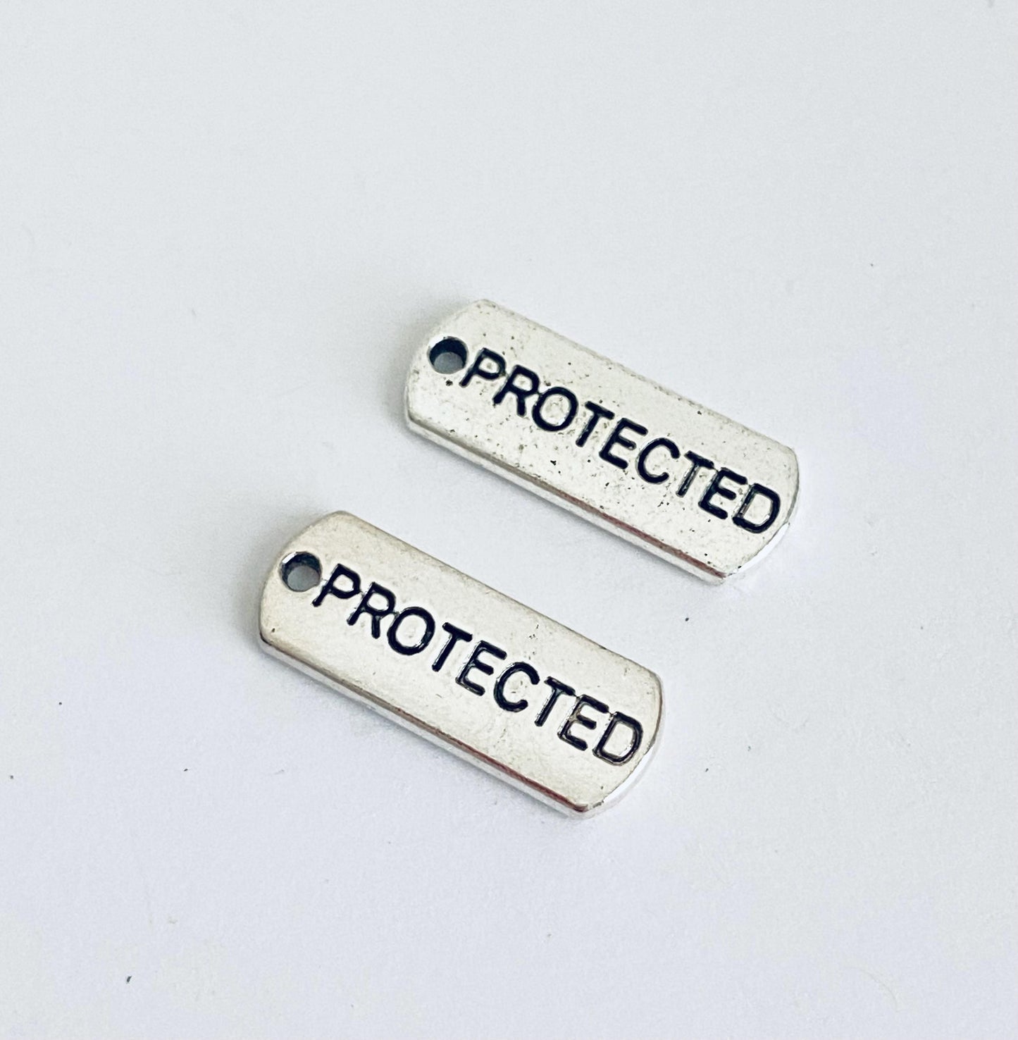 Base Metal Protected Charm
