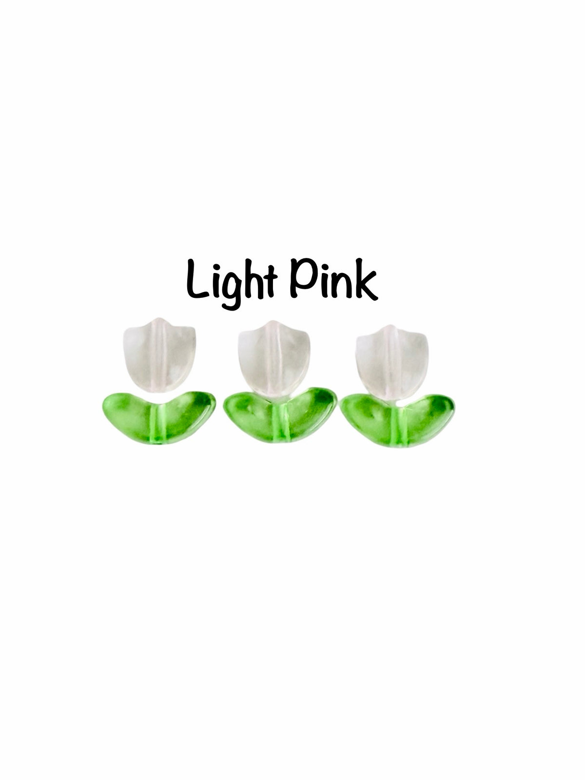 Three tulip-shaped stud earrings in light pink, with white petals and green stems, shown against a plain white background with the text 'Light Pink' above them.