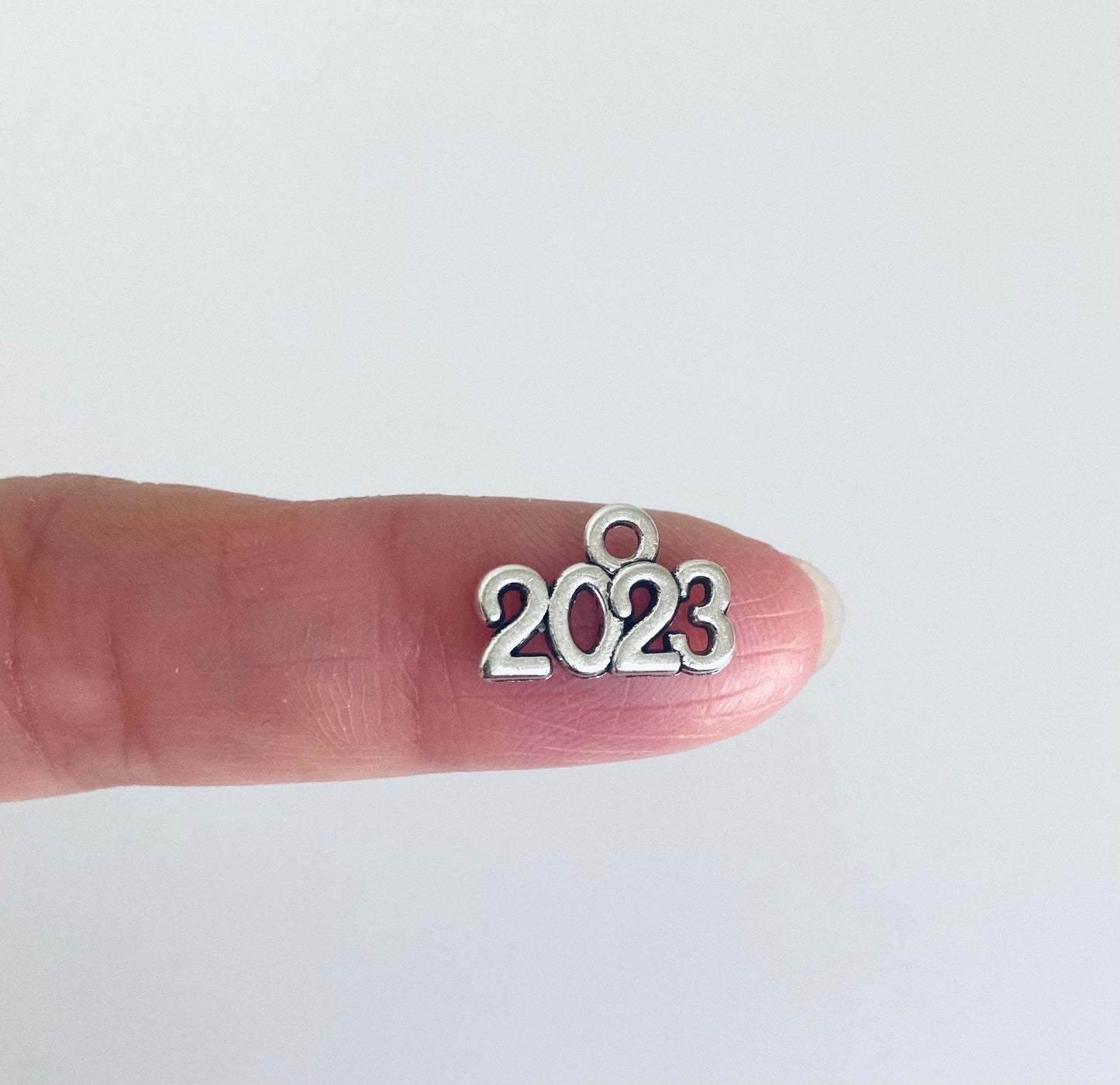 Base Metal Tiny Year Number Charm • 2022 - 2028