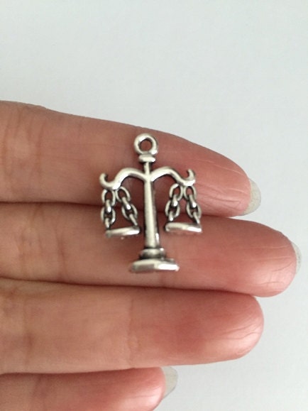 Scales Charm. Balance Charm