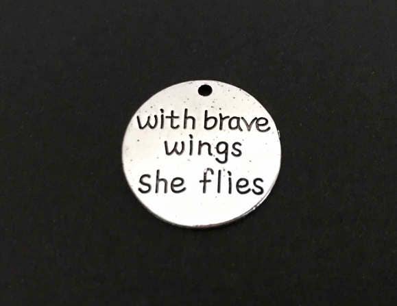 With brave wings she flies Charm