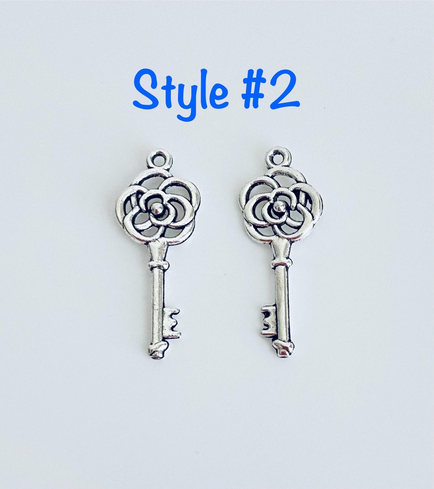 Base Metal Key Charm