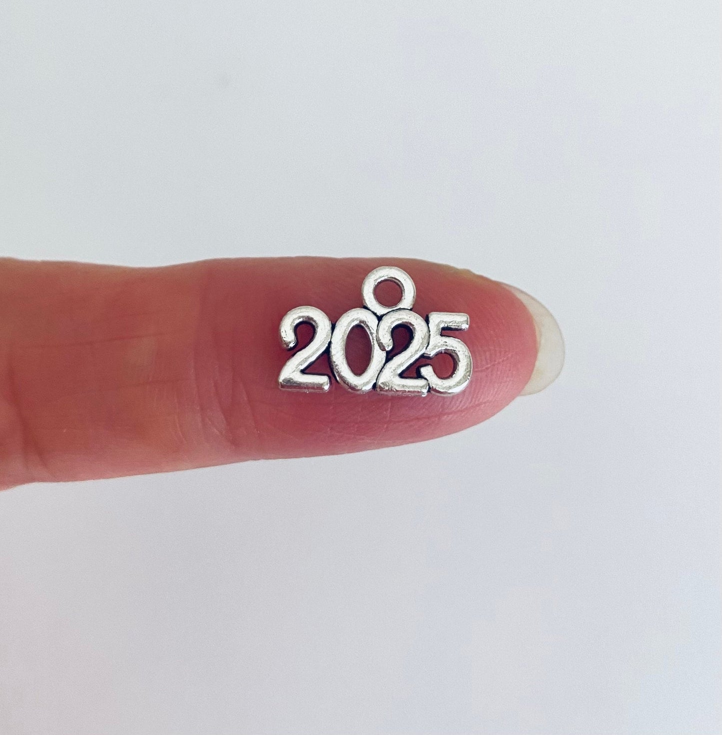 Tiny 2025 Charm
