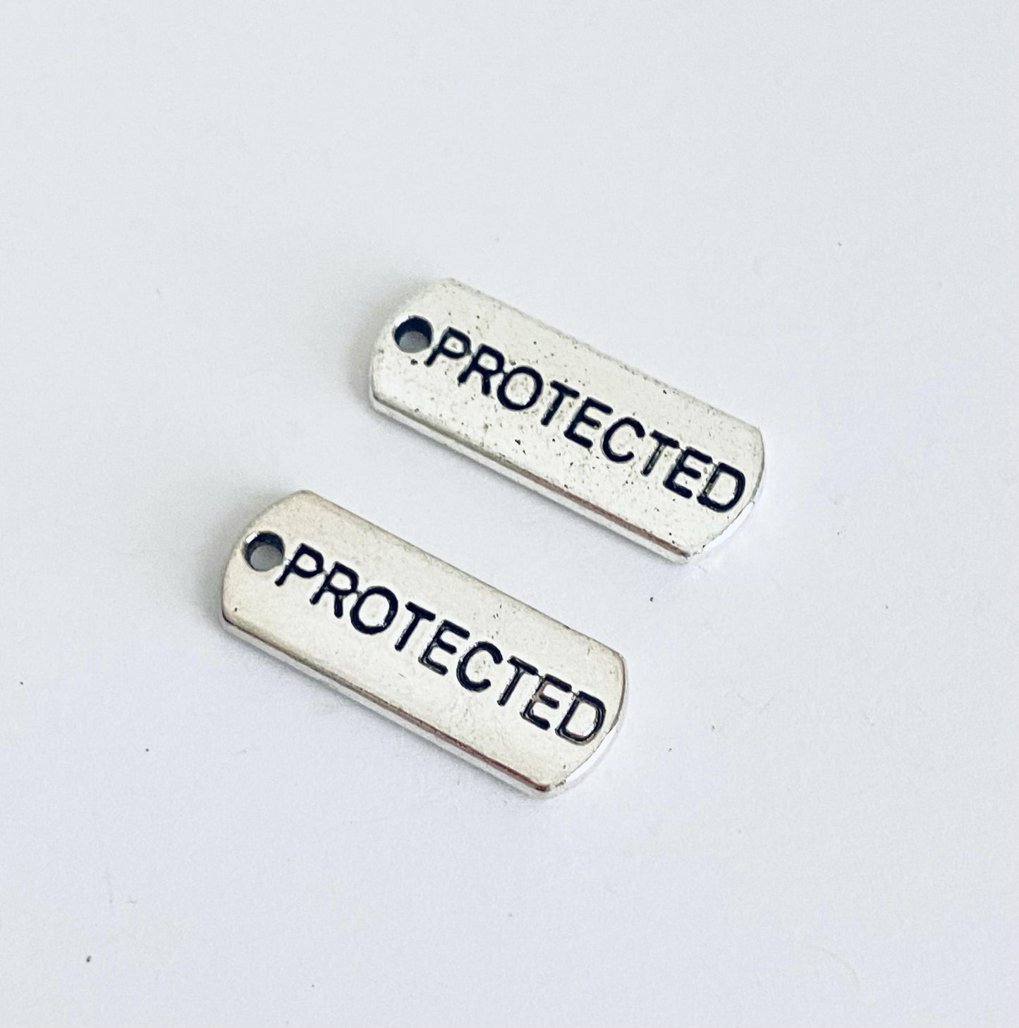 Base Metal Protected Charm