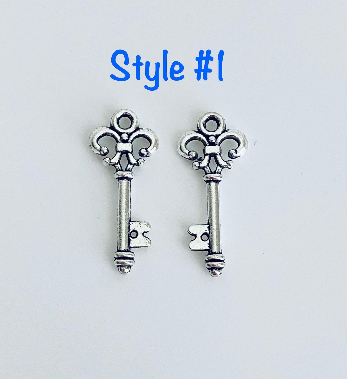 Base Metal Key Charm